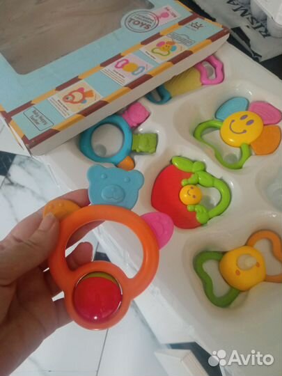 Игрушки погремушки-прорезыватели