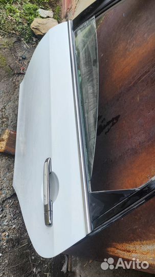 Дверь левая задняя Nissan Almera g15