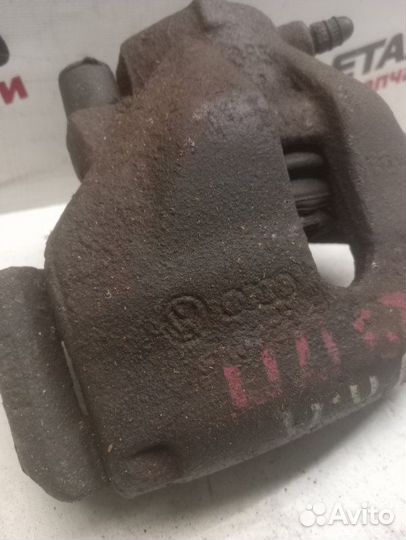 Суппорт тормозной передний правый Volkswagen