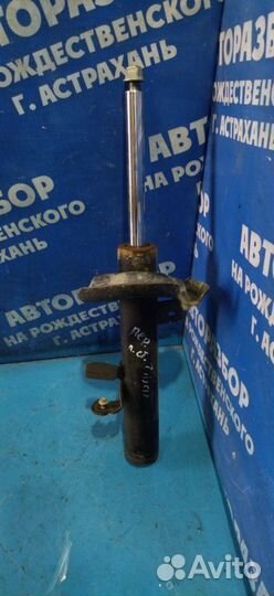 Передняя левая стойка амортизатора Ford Focus 2