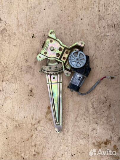 Стеклоподьемник задний левый Geely Mk