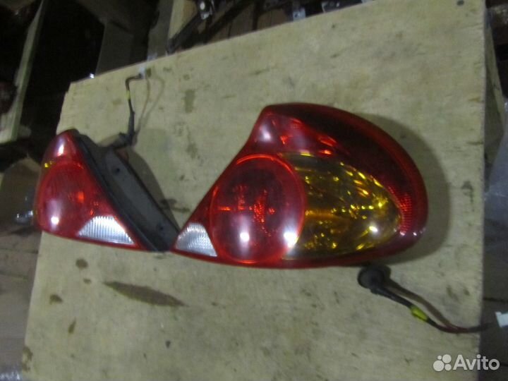 Фонарь задний левый правый Kia Spectra