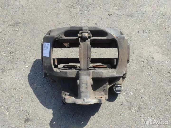 Суппорт тормозной передний левый Man Tgx