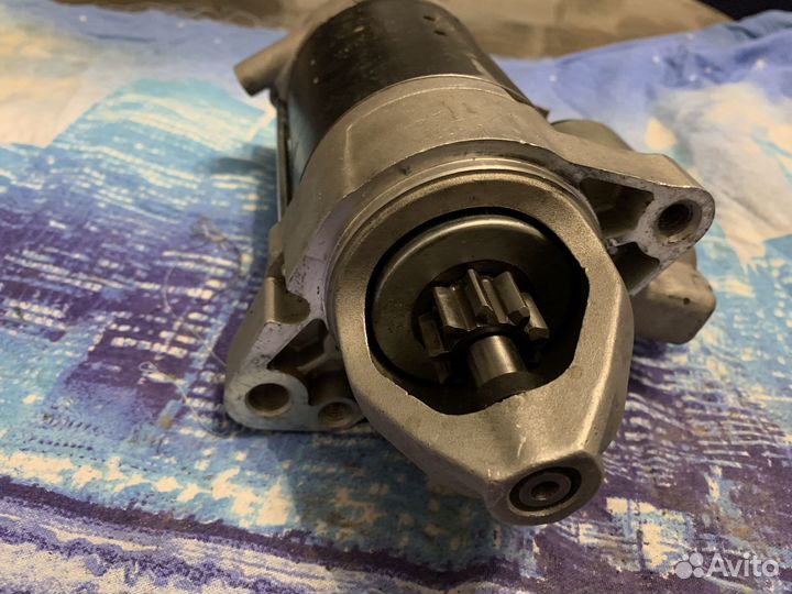 Стартер на audi q7 номер 057911023Е