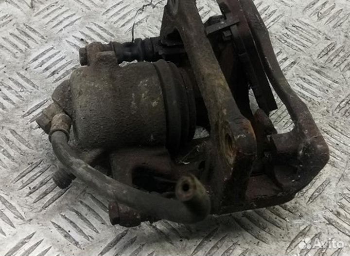 Суппорт передний левый Suzuki Swift