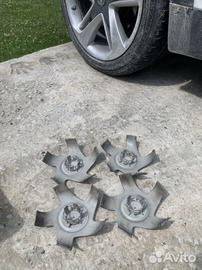 Колпачки на литые диски Opel Astra