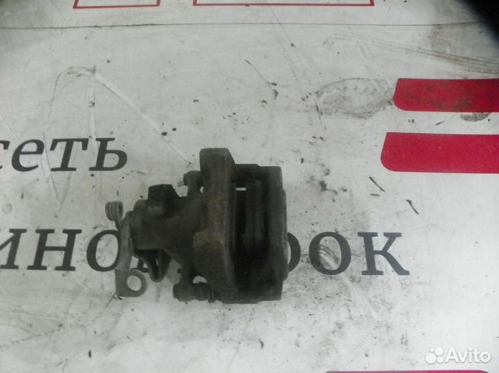 Суппорт тормозной задний левый Peugeot 3008