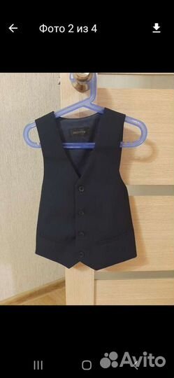 Жилет новый школьнику 7-8 лет