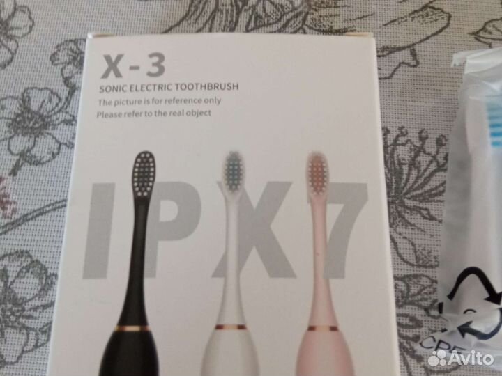 Электронная зубная щетка