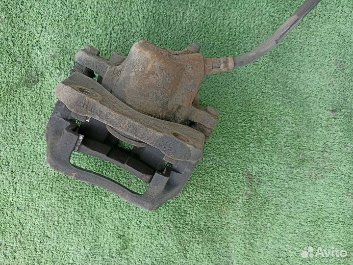 Тормозной суппорт передний правый Renault Logan