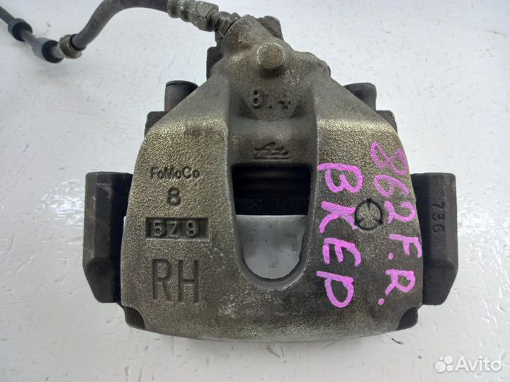 Суппорт передний правый Mazda Axela bkep LF 2006