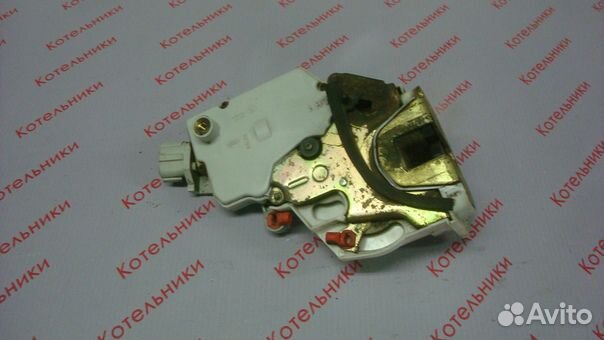 Nissan 82503-2F000 Замок задний левый