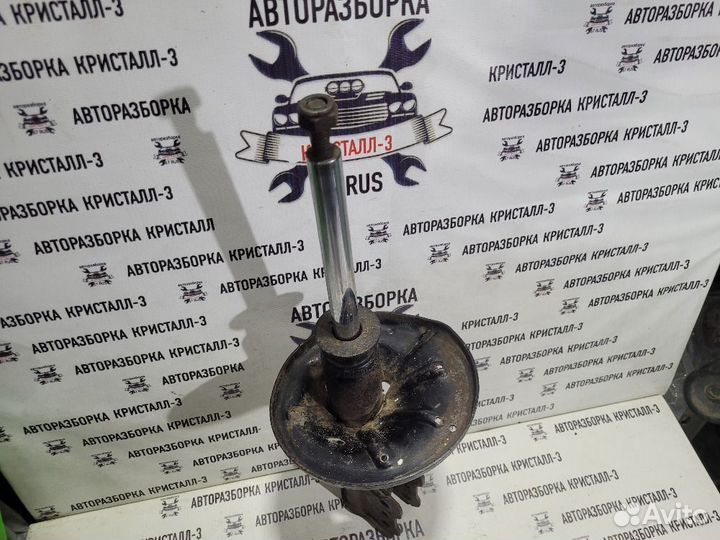 Стойка передняя правая Mazda 626 GE