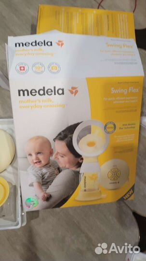 Молокоотсос medela swing flex