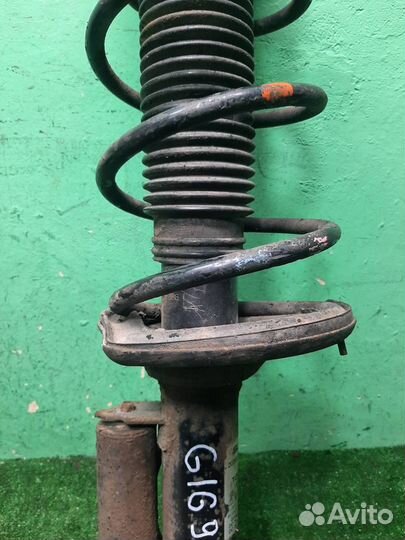 Стойка амортизатора задняя левая Subaru Forester