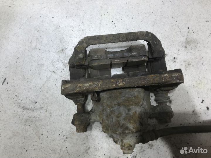 44001JG00A Суппорт задний R Nissan X-Trail T31