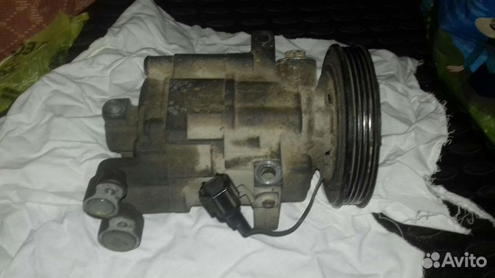 Компрессор кондиционера Nissan Nokia