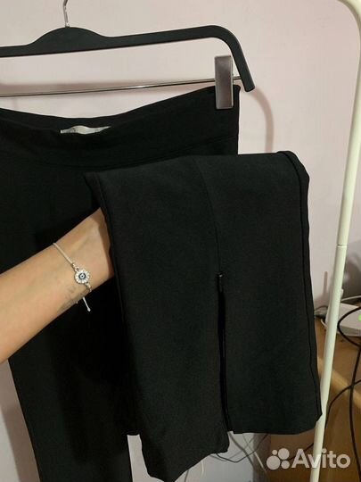 Брюки клеш с разрезами на молнии