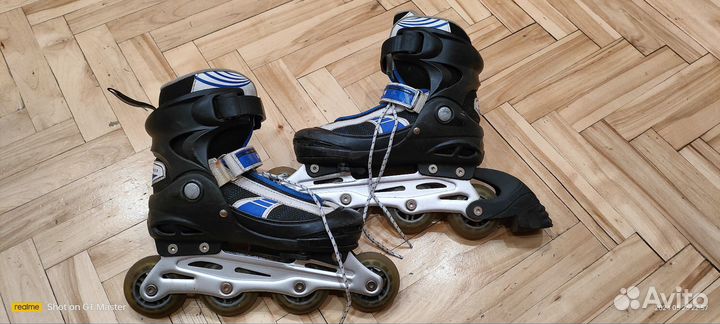 Роликовые коньки