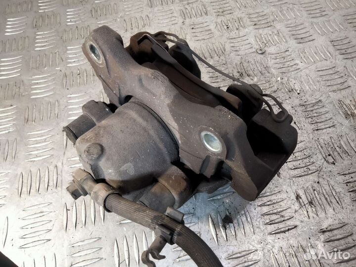 Суппорт передний левый Opel Astra H