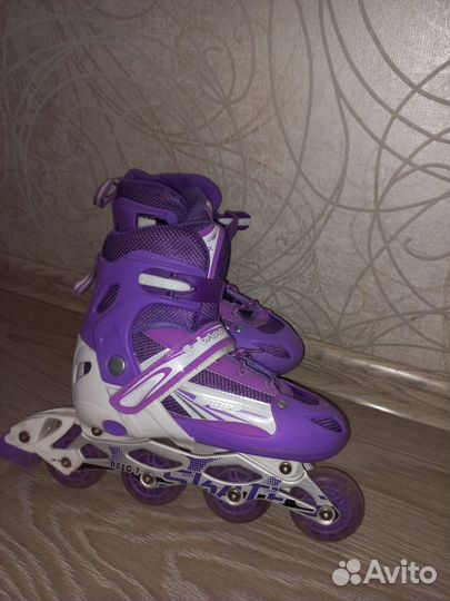 Роликовые коньки