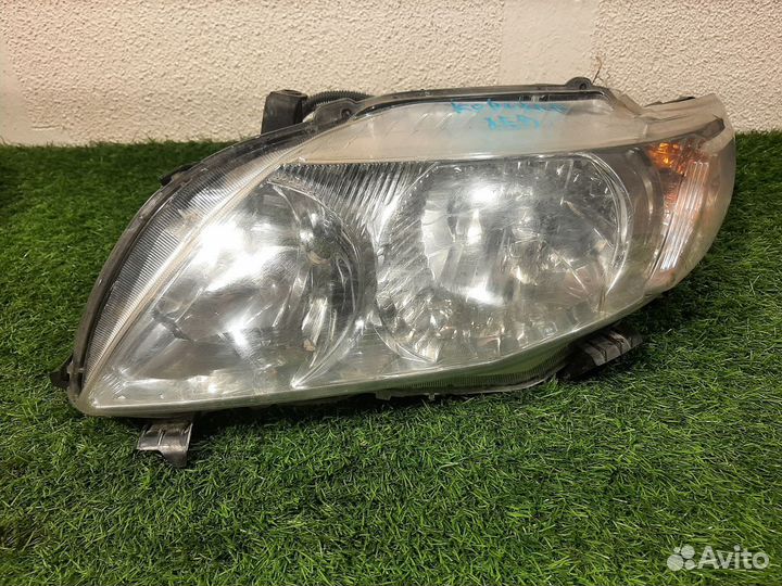 Фара левая на Toyota Corolla X E150