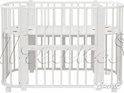 Детская кроватка с маятником