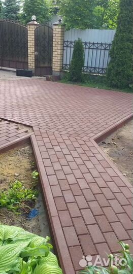 Укладка тротуарной плитки брусчатки
