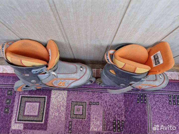 Роликовые коньки