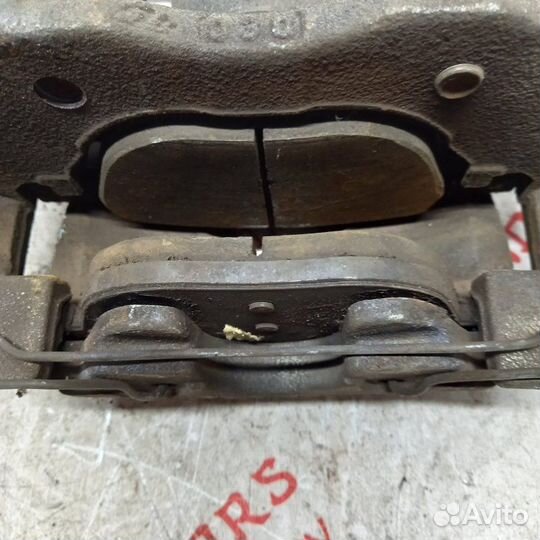 Суппорт тормозной передний правый Mazda 3 BL