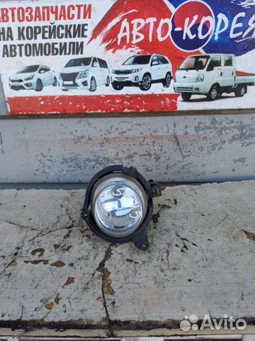 Фонарь противотуманный передний левый Ssang Yong