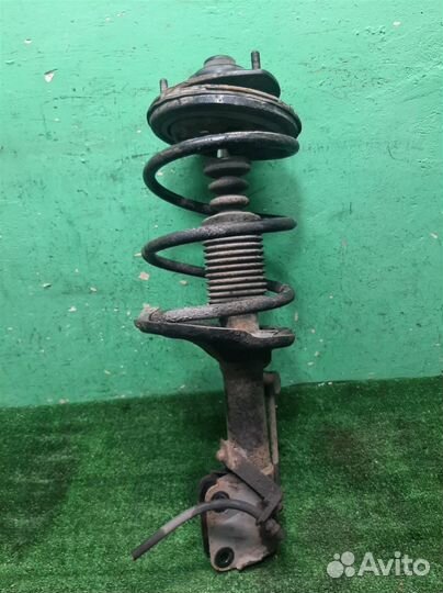 Стойка амортизатора передняя правая Mitsubishi Gr