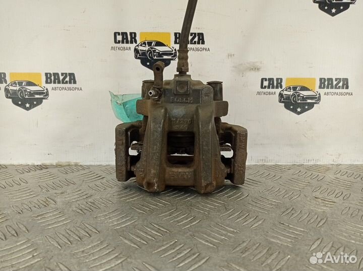 Суппорт тормозной задний правый R BMW 1