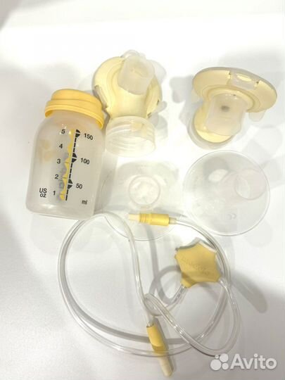 Молокоотсос электрический medela swing maxi