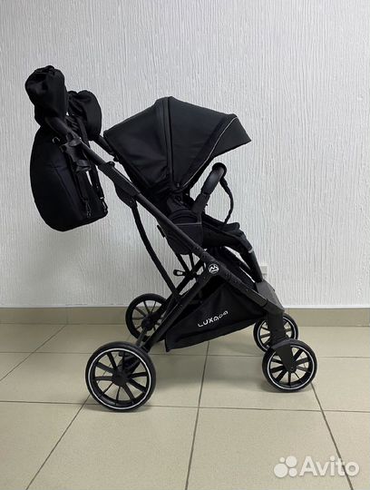 Прогулочная коляска с реверсивным блоком