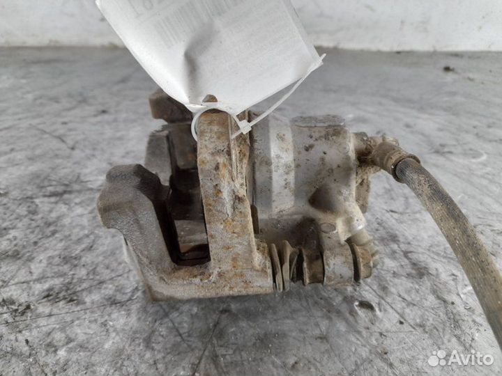 Суппорт тормозной задний левый Toyota Camry 50 55