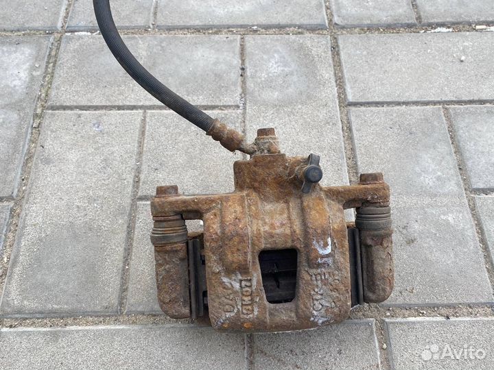 Тормозной суппорт задний правый Chevrolet Epica