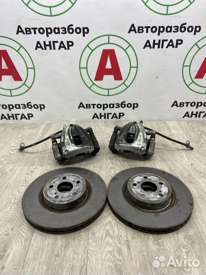 Суппорта и диски передняя Toyota Avensis T25