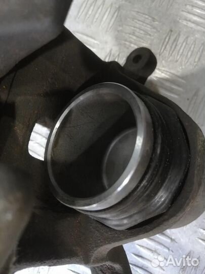 Суппорт передний левый Nissan Tiida C11