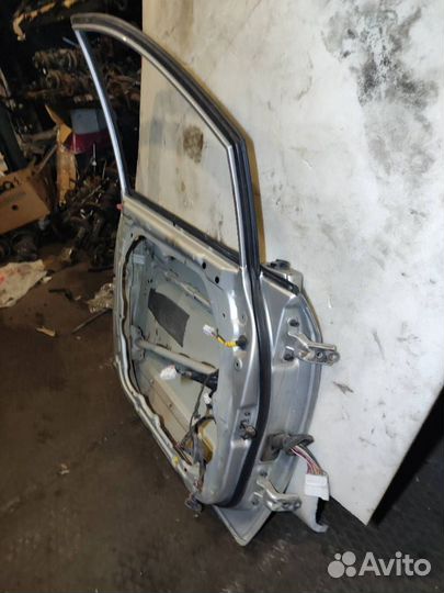 Передняя левая дверь Kia carens 2