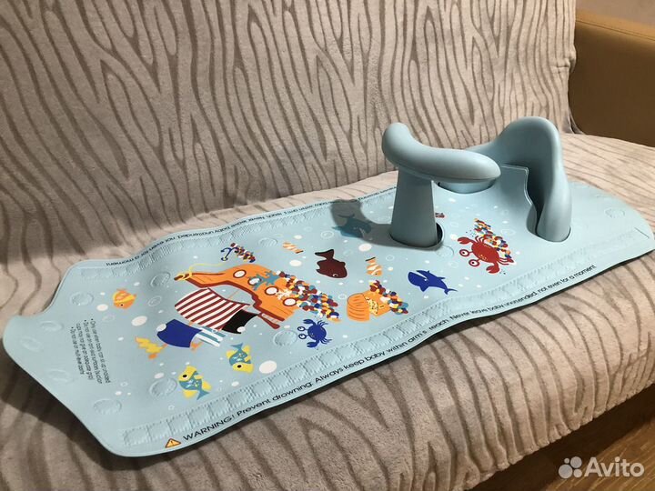 Противоскользящий коврик в ванну