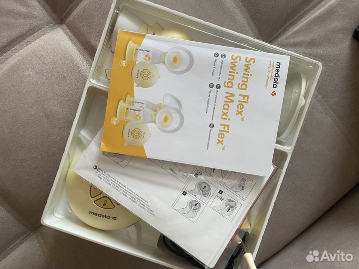 Молокоотсос medela swing maxi flex