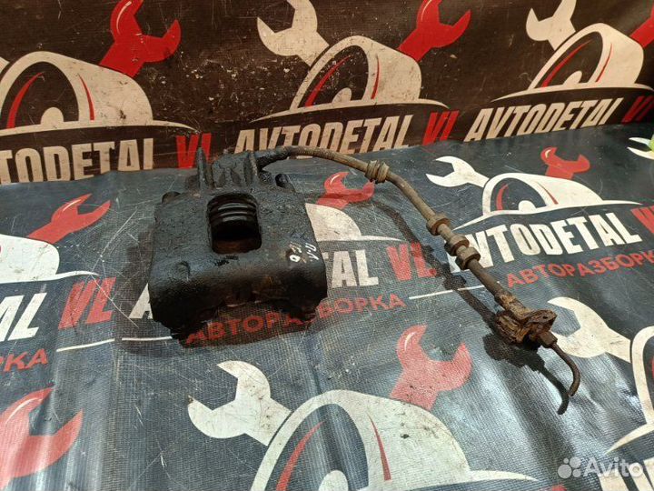 Суппорт тормозной передний левый Ford Focus 1 MK1