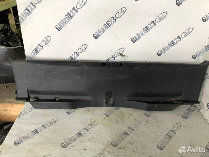 Обшивка на заднюю панель багажника Lancer 10