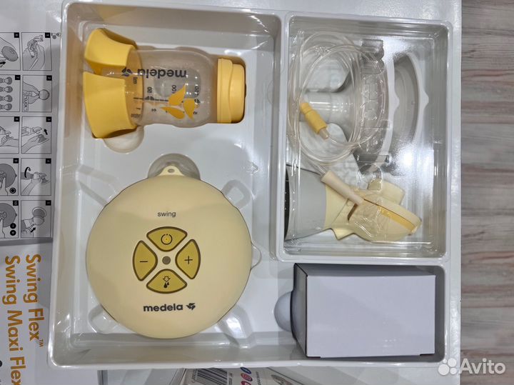 Молокоотсос medela swing flex электрический
