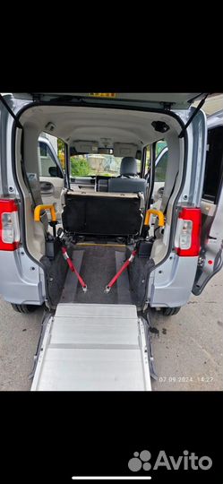 Перевозка колясочников в машине