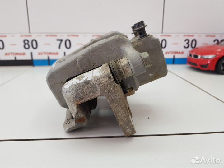 Суппорт задний левый