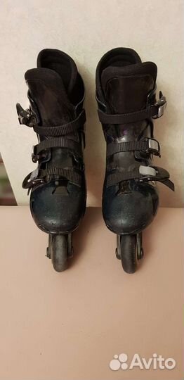 Роликовые коньки