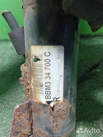 Стойка амортизатора передняя правая Mazda 3 (BL)