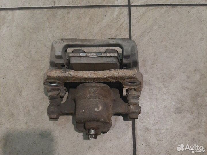 Тормозной суппорт задний правый Mazda сх7